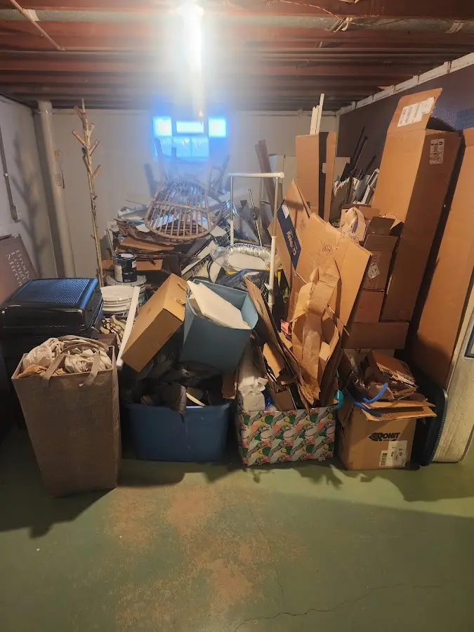 Roll-off dumpster container at job site for 8 Yard Dumpster Rental in Cutler Bay